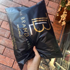 Gold logo matte black packaging bag